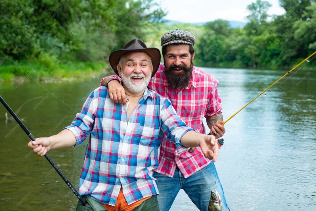 przyjaciele mezczyzna mezczyzni hobby i rekreacja rybacy udane lowienie ryb emerytura rybaka emerytowany biznesmen w garniturze z wedka meska przyjazn dziadek i drandson lowiacy ryby 265223 47068.avif